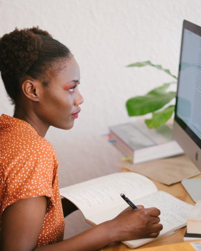 photo-of-woman-looking-on-computer-3059748